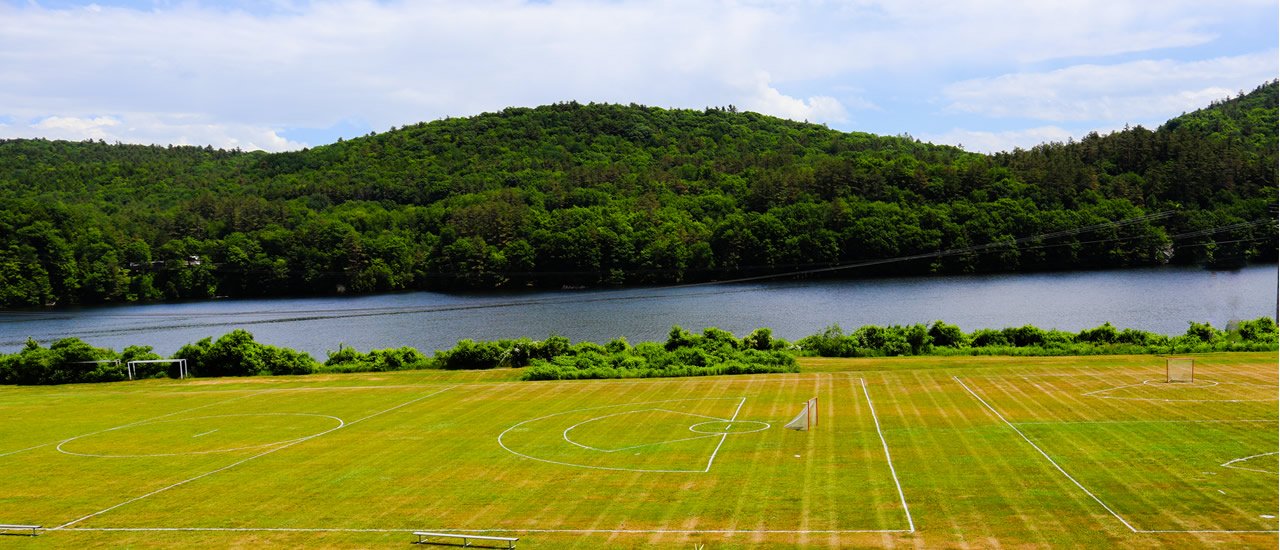 soccer field with vermont mountians in background